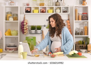 Beautiful Pregnant Woman With Food