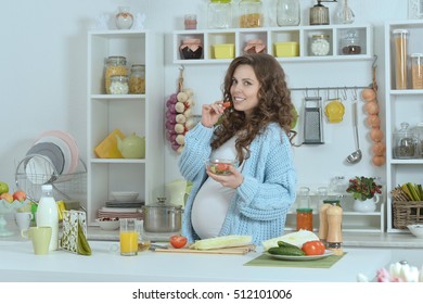 Beautiful Pregnant Woman With    Food