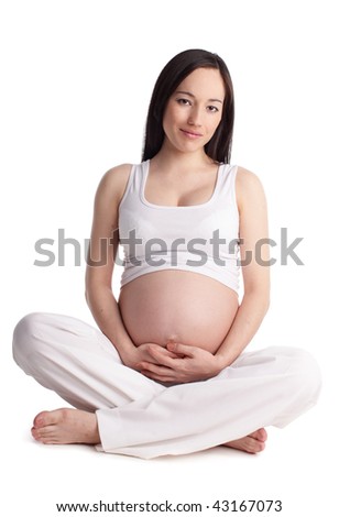 Beautiful pregnant woman isolated on white background