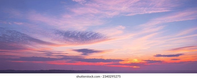Beautiful purple tinted sunset sky and clouds, dramatic sunset - Shutterstock ID 2340295275