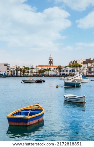 Beautiful quay with historic architecture and boats on blue water in Arrecife, Lanzarote, Canary Islands, Spain Foto stock © 