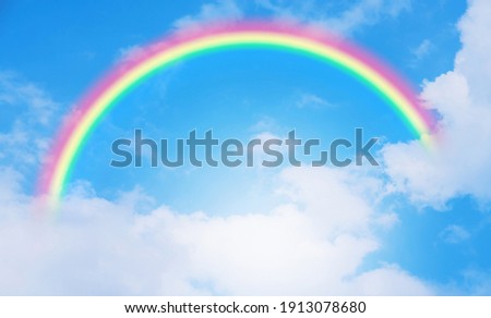 Beautiful rainbow and Blue sky with cloud in summer day.