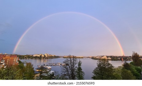 Beautiful Rainbow In Stockholm, Sweden. Rainbow Over The Lake Mälaren. Lovely Water View In Stockholm.