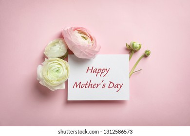 Beautiful ranunculus flowers and card with text Happy Mother's Day on pink background, top view - Powered by Shutterstock