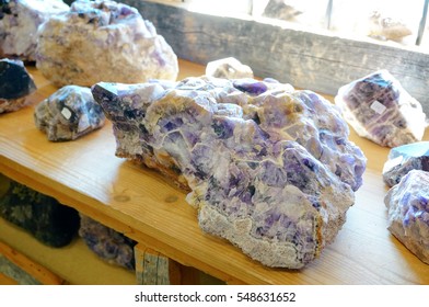 Beautiful Raw Amethyst Natural Crystals Gemstone In Souvenir Shop. It Came From Amethyst Mine In Lapland, Northern Finland