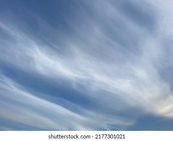 Beautiful Real White Feathery Wispy Cirrus Clouds In Blue Sky