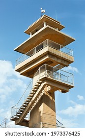 beautiful rectangular tower with steps leading to the top