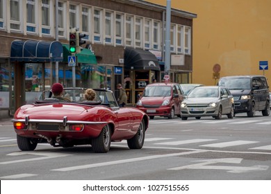 Beautiful red convertible car on the street in Turku, Finland
