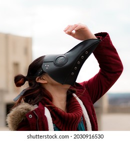 Beautiful Red Female Plague Doctor Dancing And Posing.