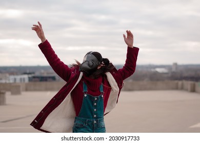 Beautiful Red Female Plague Doctor Dancing And Posing.