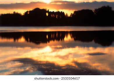 Beautiful red and gold sunset landscapes over the lake. Twilight, reflection, clouds. Peace, tranquility, eternity, relaxation, meditation. Beautiful landscape, background, design - Powered by Shutterstock