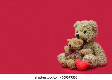 Beautiful Red Heart And Teddy Bear Together Decoration On Red Background, Good Feeling For Couple, Romantic Symbol For Your Pattern, Your Design, Card, Postcard Or Your Surprise Valentine Concept.