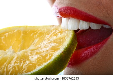 Beautiful Red Lips Biting A Fruit