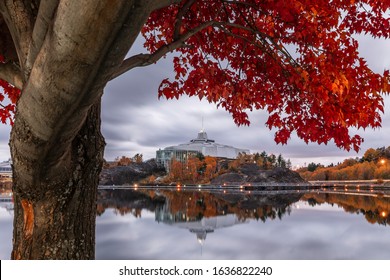 A Beautiful Red Maple Frames The Shores Of Ramsey Lake And Science North In Sudbury, ON.