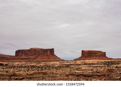 The Beautiful Red Mesas In Southwestern Utah Are Named, The Monitor And The Merrimac.  The Names Are Derived From The Ironclad Civil War Ships Of The Same Name. They Dot The Western Sky Near Moab, UT.