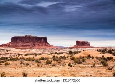 The Beautiful Red Mesas In Southwestern Utah Are Named, The Monitor And The Merrimac.  The Names Are Derived From The Ironclad Civil War Ships Of The Same Name. They Dot The Western Sky Near Moab, UT.