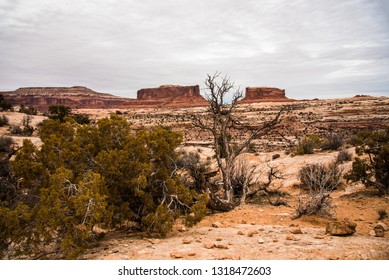 The Beautiful Red Mesas In Southwestern Utah Are Named, The Monitor And The Merrimac.  The Names Are Derived From The Ironclad Civil War Ships Of The Same Name. They Dot The Western Sky Near Moab, UT.