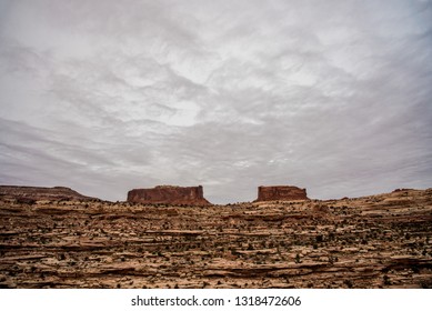 The Beautiful Red Mesas In Southwestern Utah Are Named, The Monitor And The Merrimac.  The Names Are Derived From The Ironclad Civil War Ships Of The Same Name. They Dot The Western Sky Near Moab, UT.