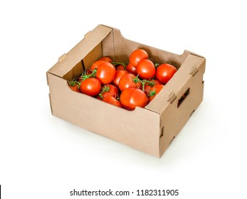 A lot of beautiful red ripe tomatoes in a cardboard container lying on a white isolated background.