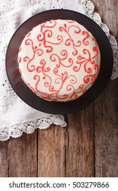 Beautiful Red Velvet Cake Close Up On The Table. Vertical View From Above
