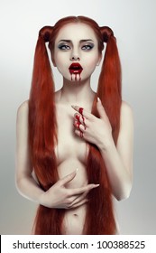 Beautiful redhead bleeding woman