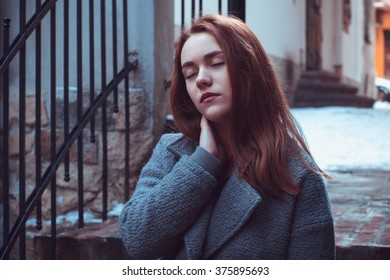 Beautiful redhead woman with closed eyes 
