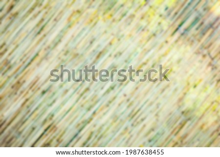 Beautiful reed fence wall on pyrode background