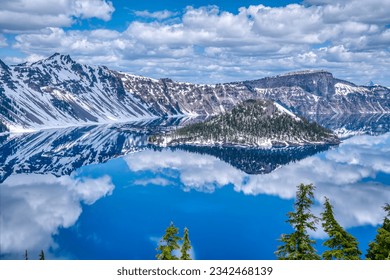 Beautiful reflection in the caldera of Crater Lake in Crater Lake National Park, Oregon - Powered by Shutterstock