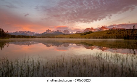 Beautiful Reflection In An Idaho Mountain Lake At Sunrise