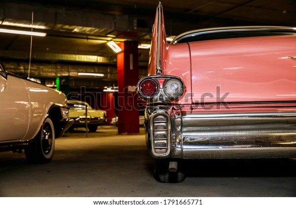 beautiful retro car of pink\
color.