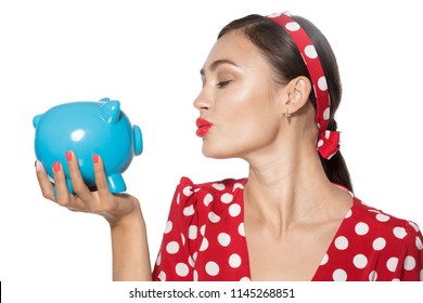 Beautiful Retro Woman Hold Piggy Bank