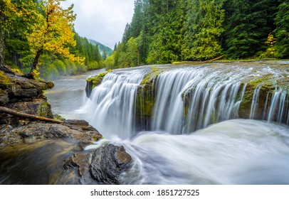 Beautiful River Waterfall In Autumn Forest Landscape