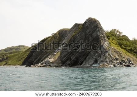 A beautiful rock stretching into the Sea of ​​Japan, the Russian border with North Korea and China.
