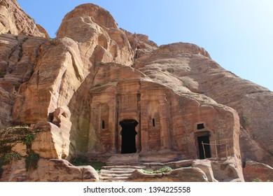 Beautiful rock-carved Broken Pediment Tomb facade in Wadi Farasa valley in a famous historical and archaeological city of Petra, Wadi Musa, Jordan