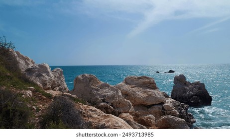 beautiful rocky shoreline, calm blue green ocean, Cyprus - Powered by Shutterstock