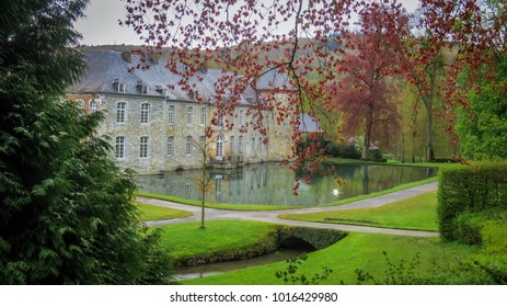 Beautiful romantic Annevoie castle stands on the lake, surrounded by the famous Annevoie water gardens.