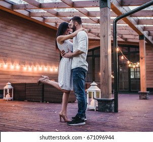 Beautiful romantic couple. Hugging, smiling and enjoing the company of each other. - Powered by Shutterstock