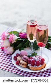 Beautiful And Romantic Proposal On Saint Valentine's Day In Paris - City Of Love. Bouquet Of Pink Roses, Two Glasses Of Wine, Raspberry Cake. Eiffel Tower On Background. Close Up Copy Space. Tonned