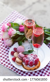 Beautiful And Romantic Proposal On Saint Valentine's Day In Paris - City Of Love. Bouquet Of Pink Roses, Two Glasses Of Wine, Macaroons, Cake. Eiffel Tower On Background. Close Up Copy Space. Tonned