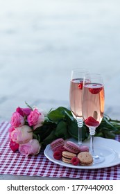 Beautiful, Romantic Proposal On Saint Valentine's Day In Paris - City Of Love. Bouquet Of Pink Roses, Two Glasses Of Wine, Macaroons. Eiffel Tower On Background. Close Up Copy Space. Tonned