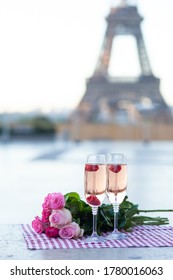 Beautiful, Romantic Proposal On Saint Valentine's Day In Paris - City Of Love. Bouquet Of Pink Roses, Two Glasses Of Wine. Eiffel Tower On Background. Close Up Copy Space. Tonned
