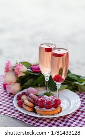 Beautiful And Romantic Proposal On Saint Valentine's Day In Paris - City Of Love. Bouquet Of Pink Roses, Two Glasses Of Wine, Macaroons, Cake. Eiffel Tower On Background. Close Up Copy Space. Tonned