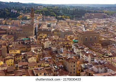 Beautiful rooftops of oldhouses and streets of Florence, Italy. Aerial view of Firenze on a sunny day. Palazzo Vecchio, Torre di Arnolfo.