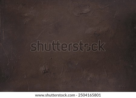 Beautiful rough structured textured dark brown surface for background