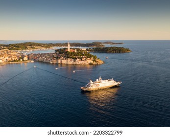 Beautiful Rovinj Town (popular Tourist Resort And An Active Fishing Port) At Sunset. Aerial Photo. The Old Town Of Rovinj, Istria, Croatia.