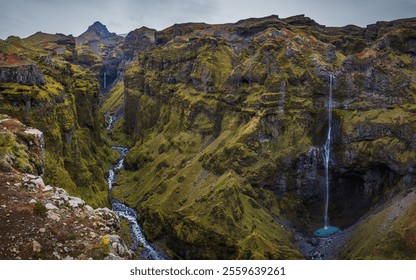 Beautiful rugged landscape at Mulagljufur canyon with cascading waterfalls, river and mossy rocks in Iceland - Powered by Shutterstock