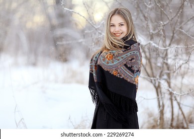 Beautiful Russian Woman In A Scarf In Winter