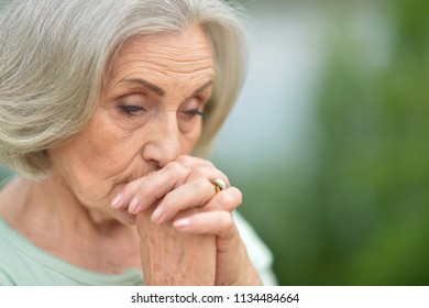 beautiful sad senior woman - Shutterstock ID 1134484664