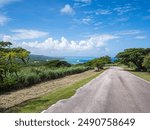 Beautiful Saipan beach road under the blue sky