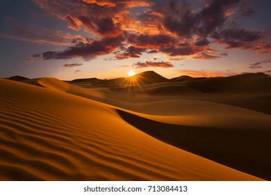 Beautiful sand dunes in the Sahara desert. - Shutterstock ID 713084413